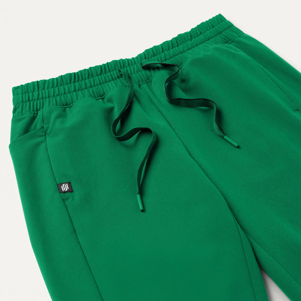 Jaanuu Scrubs Women's Effie Slim 6-Pocket Scrub Pant Emerald Green | scrub-supply.com