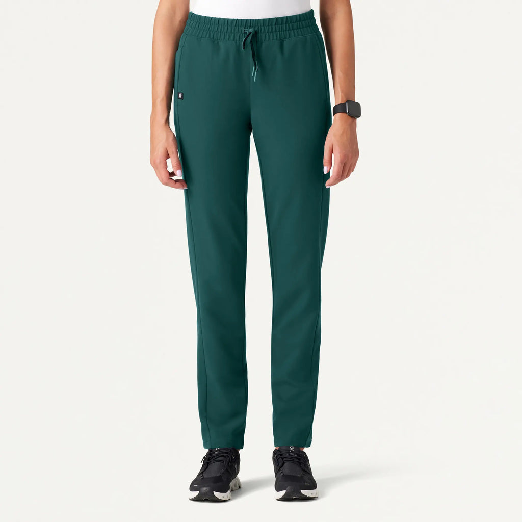 Jaanuu Scrubs Women's Effie Slim 6-Pocket Scrub Pant Midnight Green | scrub-supply.com