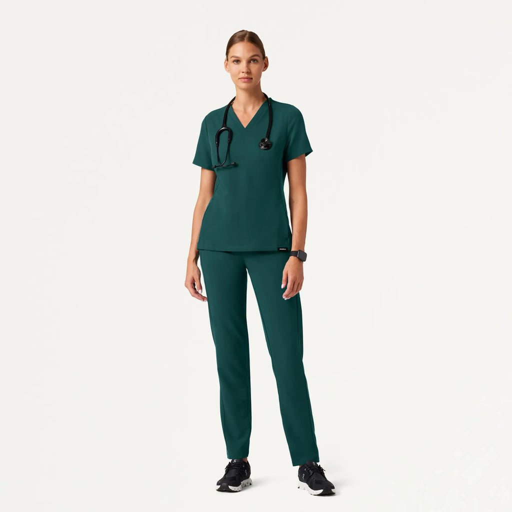 Jaanuu Scrubs Women's Effie Slim 6-Pocket Scrub Pant Midnight Green | scrub-supply.com