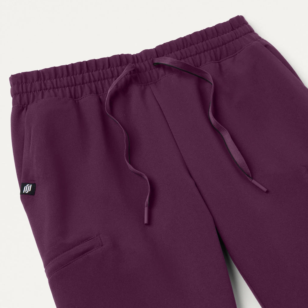 Jaanuu Scrubs Women's Jace Skinny On-the-Go Scrub Jogger Dark Amethyst | scrub-supply.com