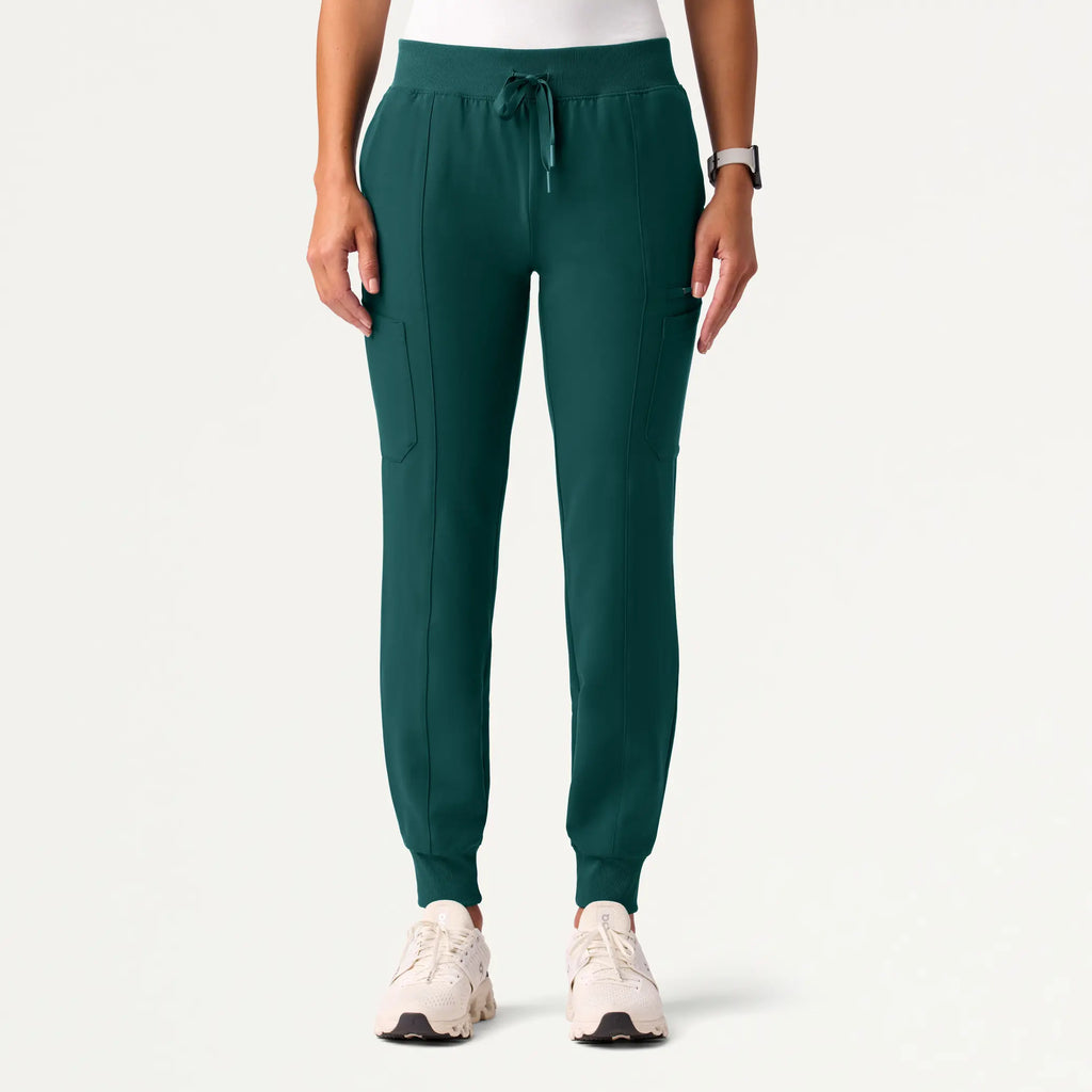 Jaanuu Scrubs Women's Liv Skinny 8-Pocket Scrub Jogger Midnight Green | scrub-supply.com