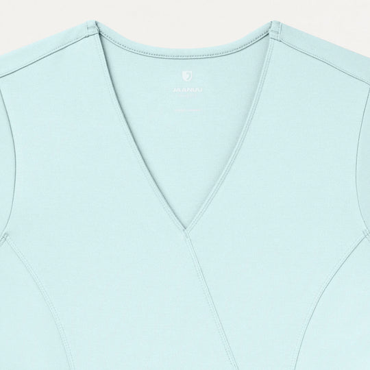 Jaanuu Scrubs Women's Isla Mock-Wrap ULTRAsoft Scrub Top Sky Blue | scrub-supply.com