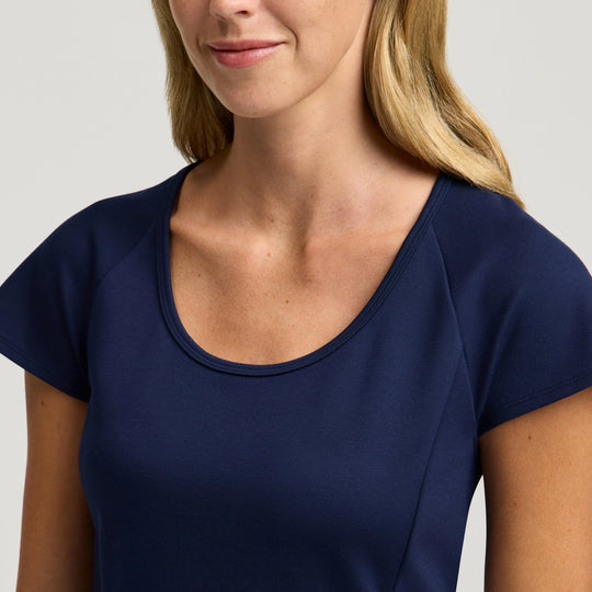 Jaanuu Scrubs Women's Sorrell Peplum Scrub Top Midnight Navy | scrub-supply.com