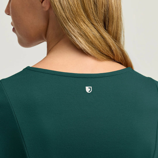 Jaanuu Scrubs Women's Kenz Buttoned 3/4-Sleeve Scrub Top Midnight Green | scrub-supply.com