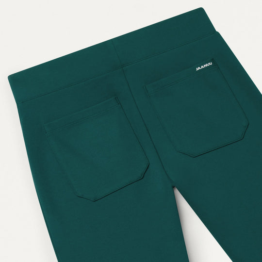 Jaanuu Scrubs Women's Nyla Super-Flare Scrub Pant Midnight Green | scrub-supply.com