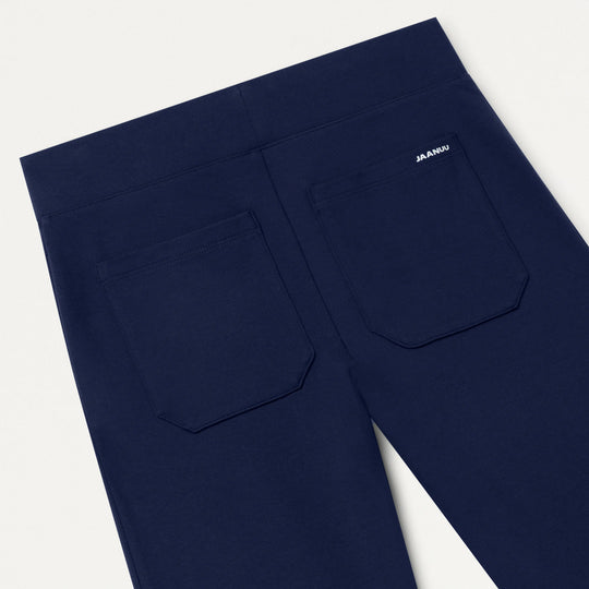 Jaanuu Scrubs Women's Nyla Super-Flare Scrub Pant Midnight Navy | scrub-supply.com