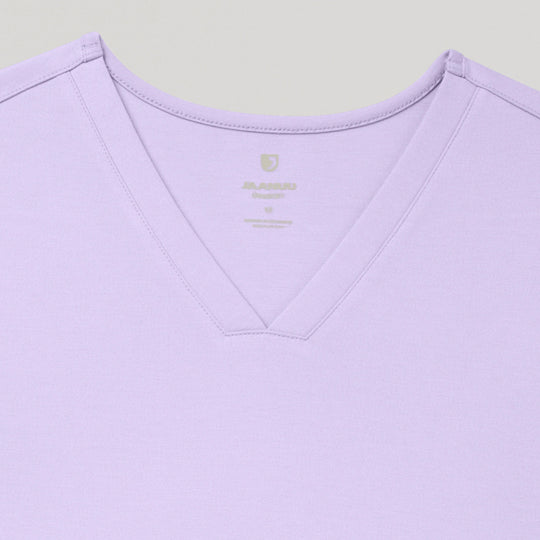 Jaanuu Scrubs Women's Cesi Slim ULTRAsoft Scrub Top Lavender | scrub-supply.com