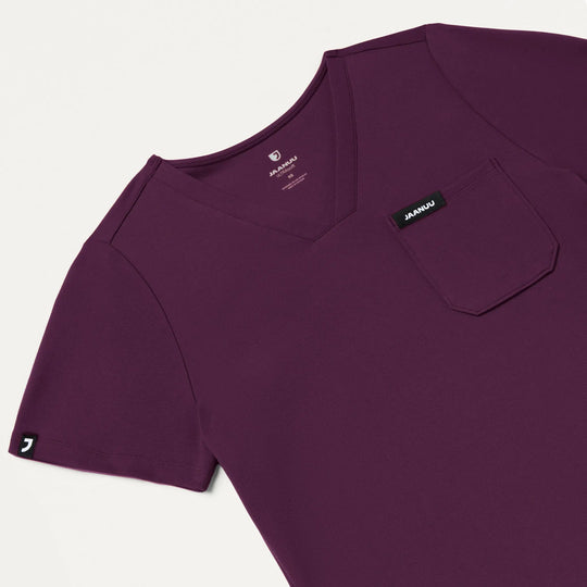 Jaanuu Scrubs Women's Sona Slim ULTRAsoft Scrub Top Deep Eggplant | scrub-supply.com