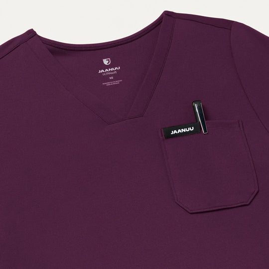 Jaanuu Scrubs Women's Sona Slim ULTRAsoft Scrub Top Deep Eggplant | scrub-supply.com