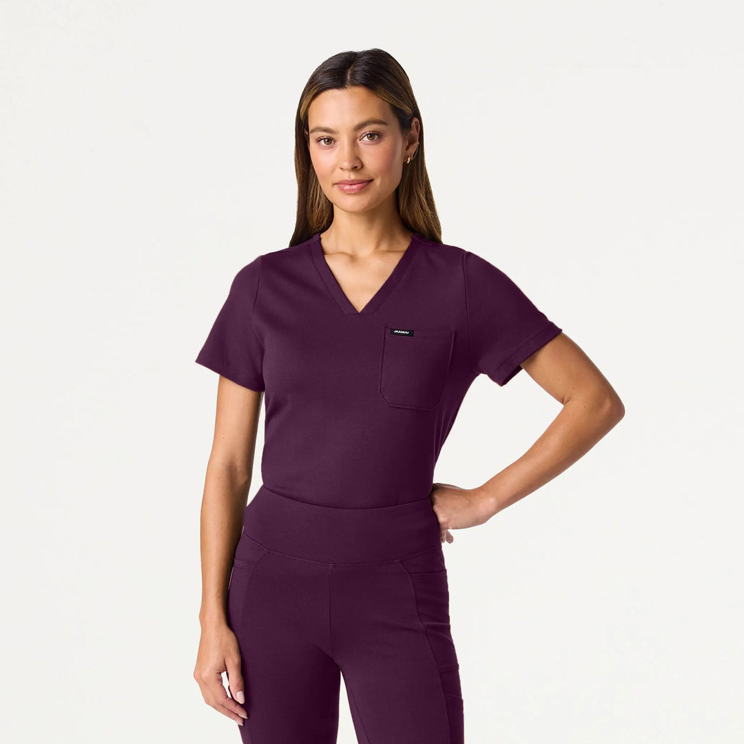 Jaanuu Scrubs Women's Sona Slim ULTRAsoft Scrub Top Deep Eggplant | scrub-supply.com