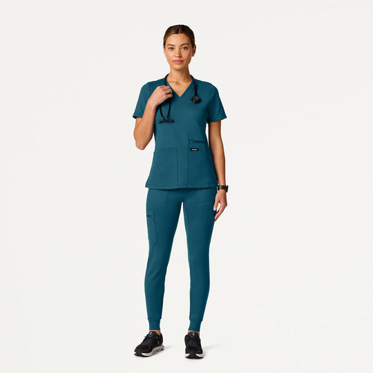 Jaanuu Scrubs Women's Kass Slim 4-Pocket ULTRAsoft Scrub Top Caribbean Blue | scrub-supply.com