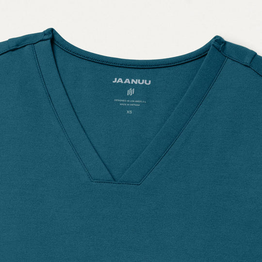 Jaanuu Scrubs Women's Kass Slim 4-Pocket ULTRAsoft Scrub Top Caribbean Blue | scrub-supply.com