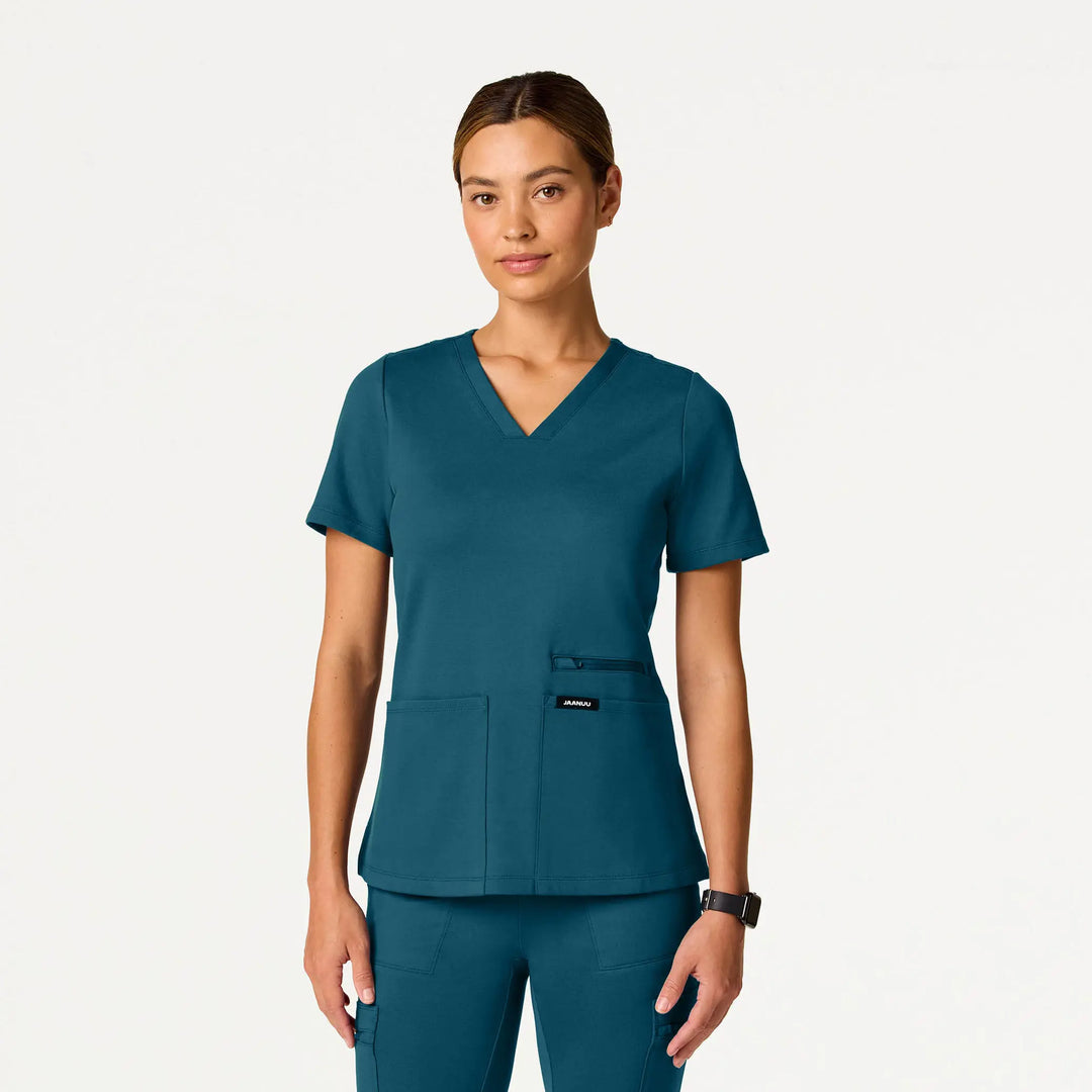 Jaanuu Scrubs Women's Kass Slim 4-Pocket ULTRAsoft Scrub Top Caribbean Blue | scrub-supply.com
