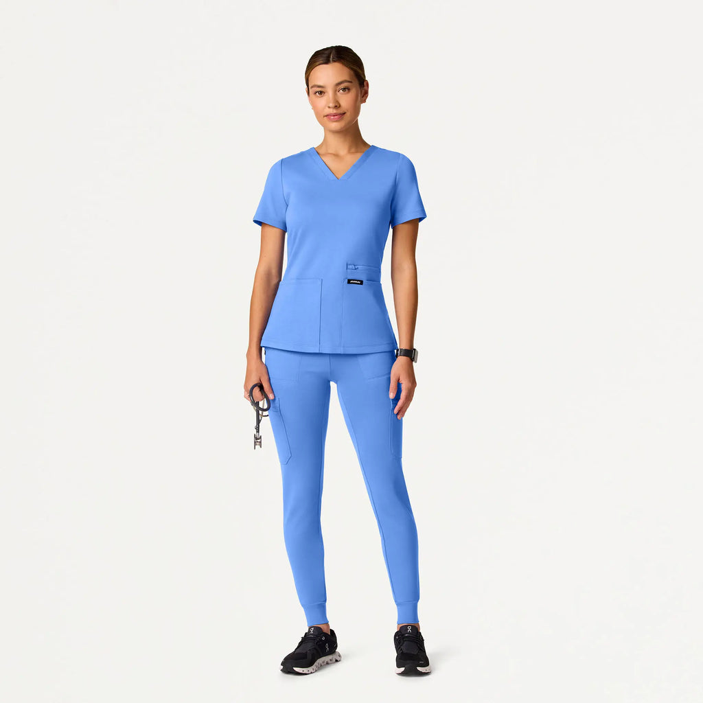 Jaanuu Scrubs Women's Kass Slim 4-Pocket ULTRAsoft Scrub Top Ceil Blue | scrub-supply.com