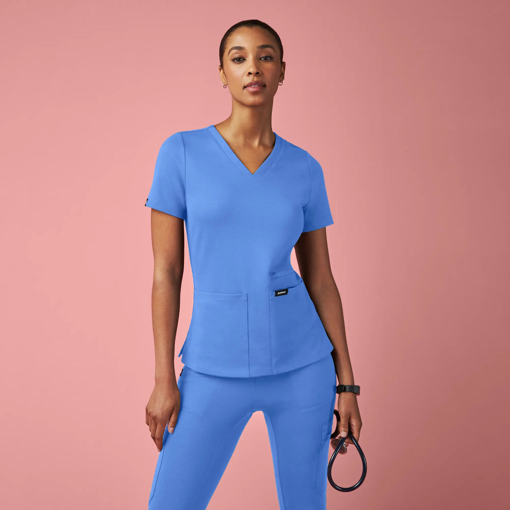 Jaanuu Scrubs Women's Kass Slim 4-Pocket ULTRAsoft Scrub Top Ceil Blue | scrub-supply.com