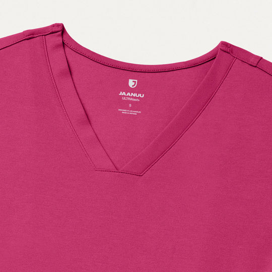 Jaanuu Scrubs Women's Kass Slim 4-Pocket Scrub Top Wild Berry | scrub-supply.com