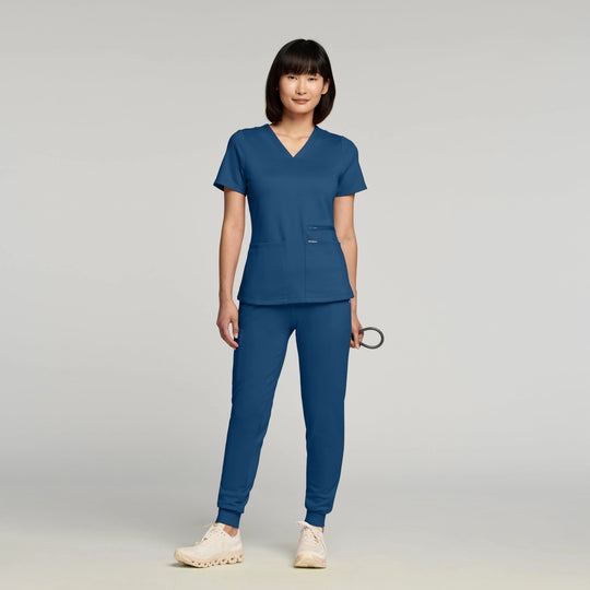 Jaanuu Scrubs Women's Kass Slim 4-Pocket Scrub Top Ocean | scrub-supply.com