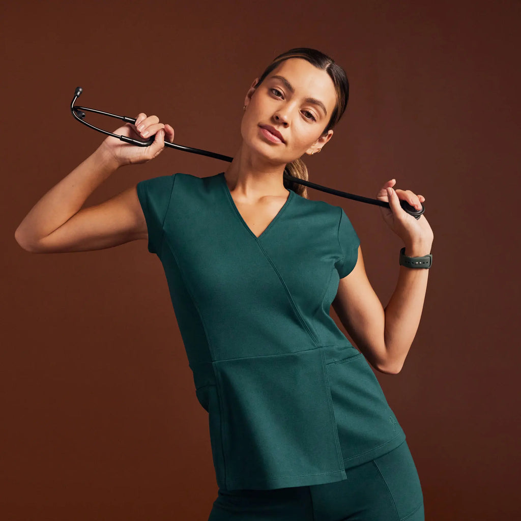 Jaanuu Scrubs Women's Isla Mock-Wrap ULTRAsoft Scrub Top Midnight Green | scrub-supply.com