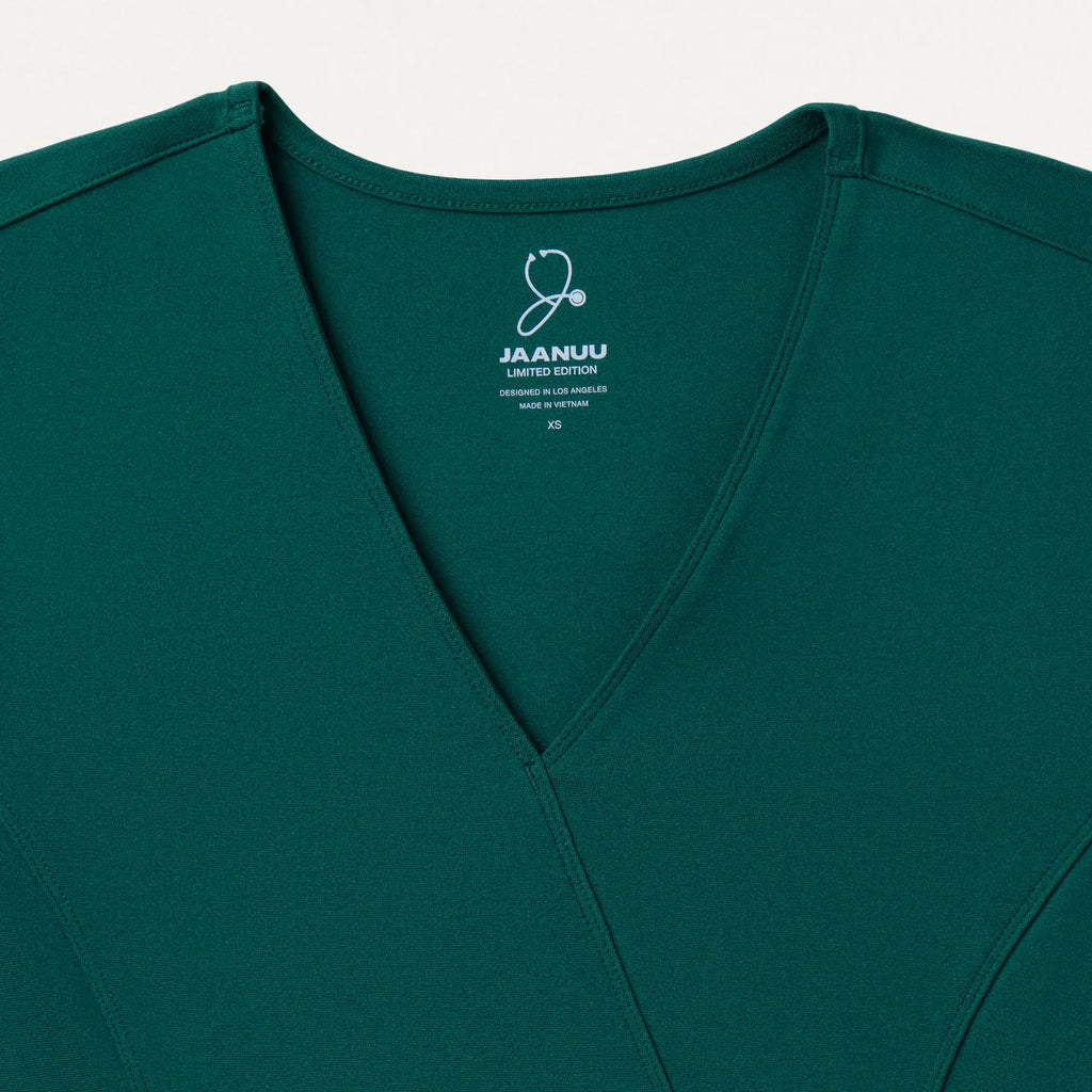 Jaanuu Scrubs Women's Isla Mock-Wrap ULTRAsoft Scrub Top Midnight Green | scrub-supply.com