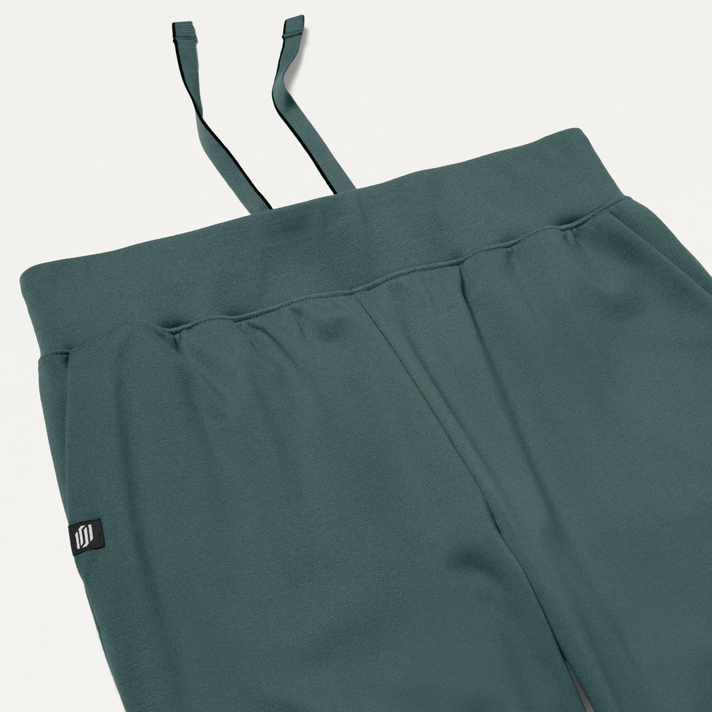 Jaanuu Scrubs Women's Rubi Slim ULTRAsoft Scrub Jogger Alpine Green | scrub-supply.com