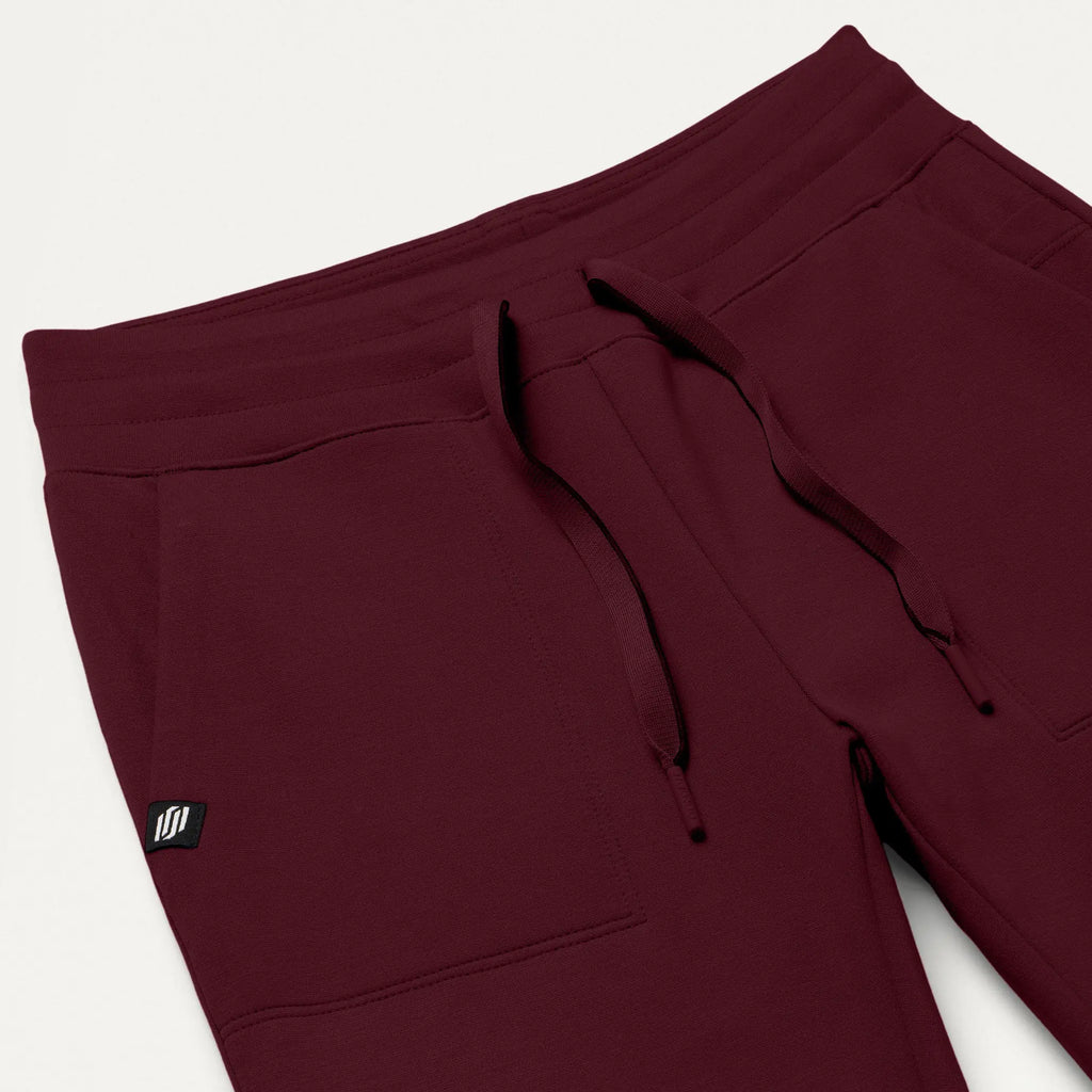 Jaanuu Scrubs Women's Kait 10-Pocket Skinny ULTRAsoft Scrub Jogger Burgundy | scrub-supply.com