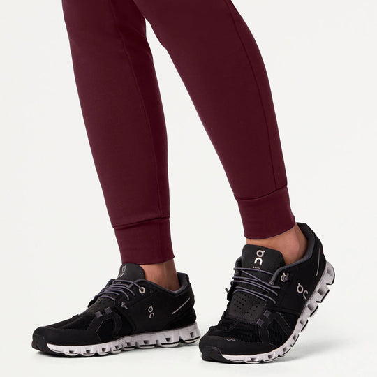 Jaanuu Scrubs Women's Kait 10-Pocket Skinny ULTRAsoft Scrub Jogger Burgundy | scrub-supply.com