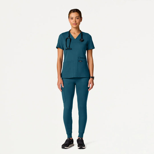 Jaanuu Scrubs Women's Kait 10-Pocket Skinny ULTRAsoft Scrub Jogger Caribbean Blue | scrub-supply.com