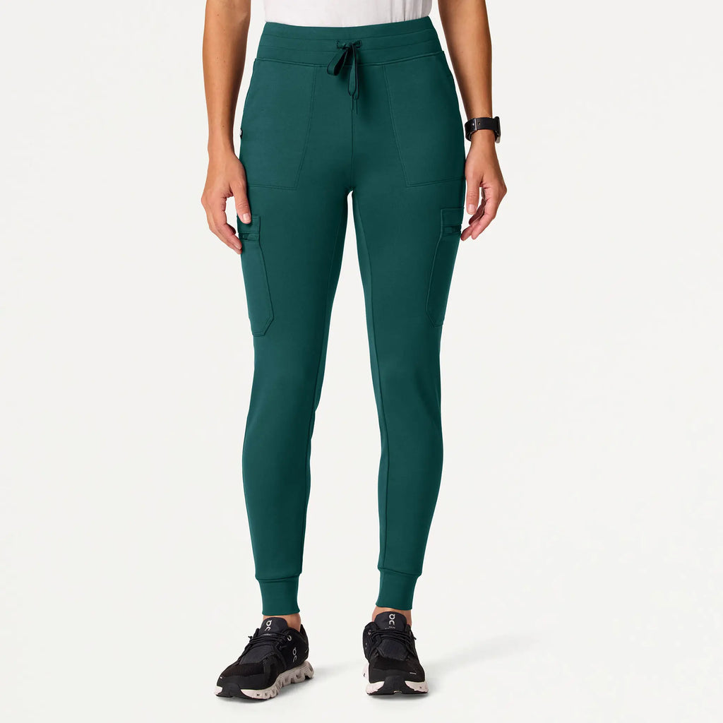 Jaanuu Scrubs Women's Kait 10-Pocket Skinny ULTRAsoft Scrub Jogger Midnight Green | scrub-supply.com