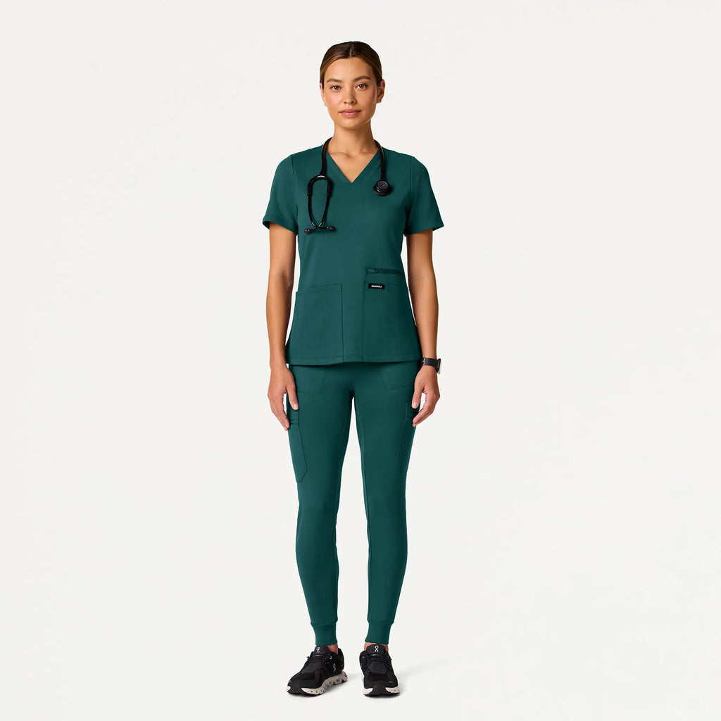 Jaanuu Scrubs Women's Kait 10-Pocket Skinny ULTRAsoft Scrub Jogger Midnight Green | scrub-supply.com