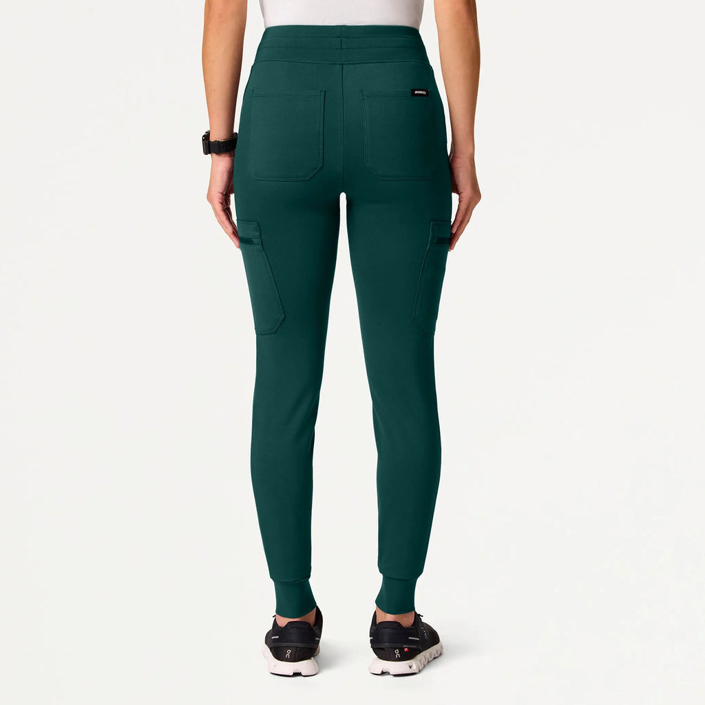 Jaanuu Scrubs Women's Kait 10-Pocket Skinny ULTRAsoft Scrub Jogger Midnight Green | scrub-supply.com