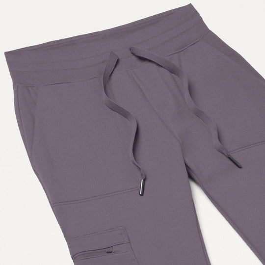 Jaanuu Scrubs Women's Kait 10-Pocket Skinny Scrub Jogger Titanium | scrub-supply.com