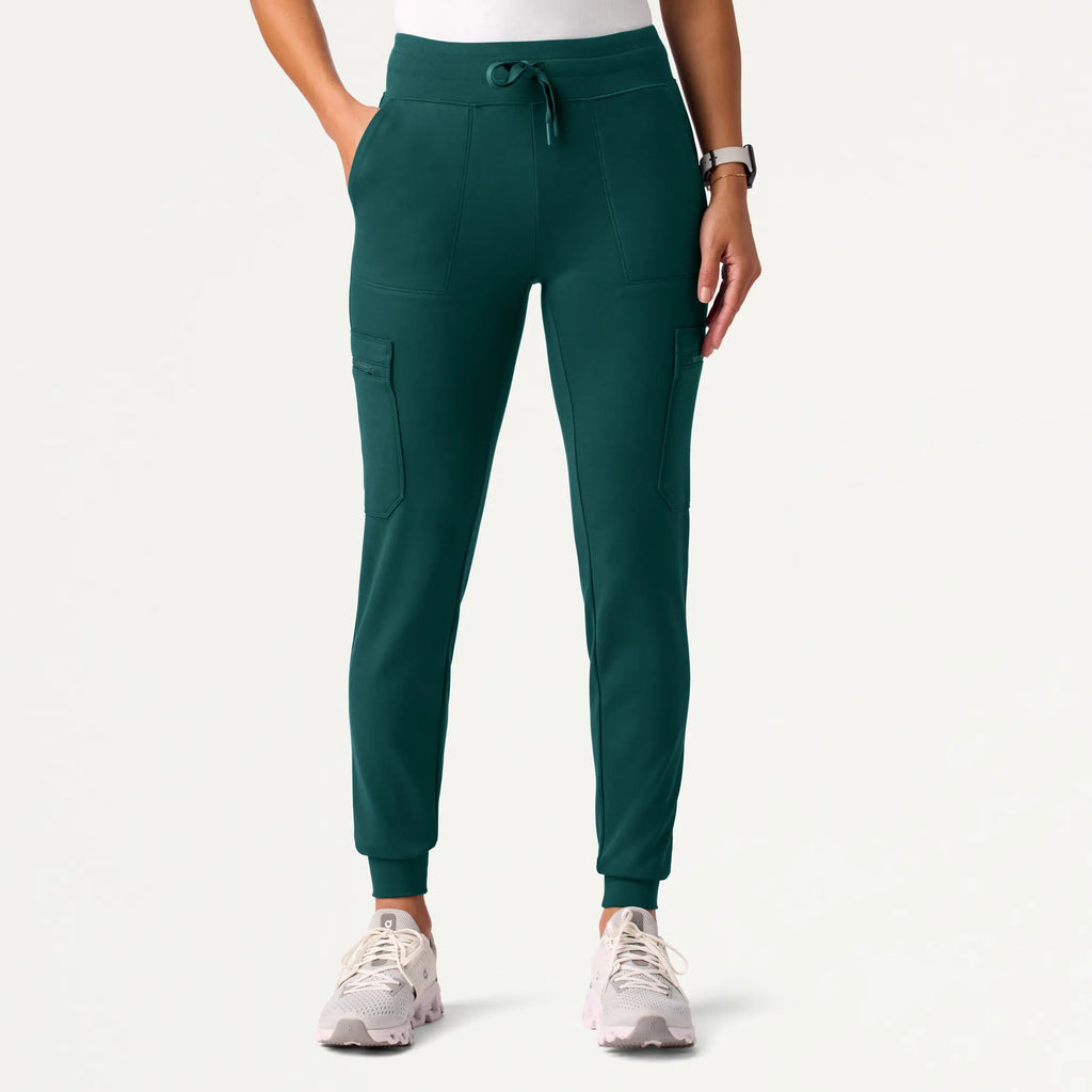 Jaanuu Scrubs Women's Abi 10-Pocket Skinny ULTRAsoft Scrub Jogger Midnight Green | scrub-supply.com