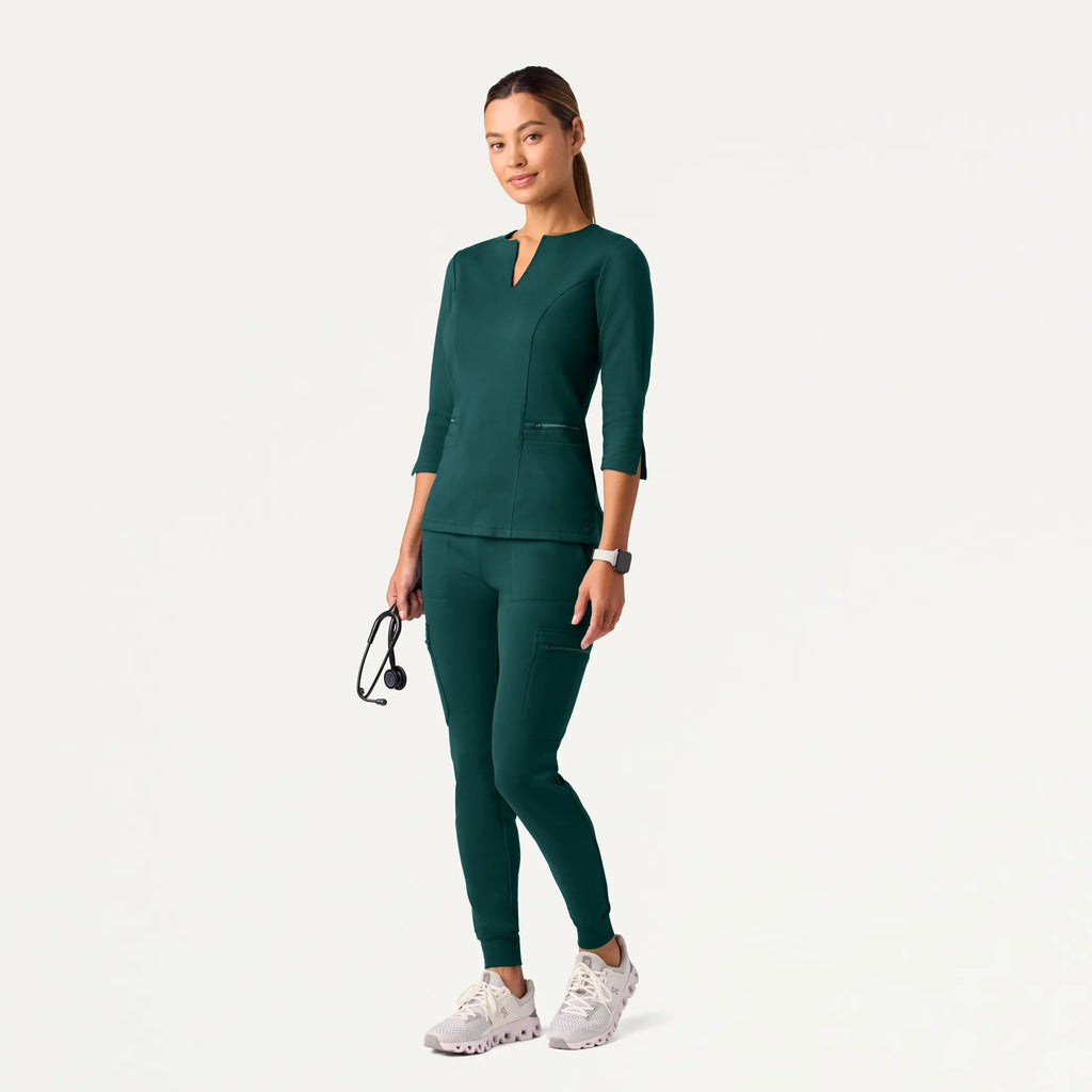 Jaanuu Scrubs Women's Abi 10-Pocket Skinny ULTRAsoft Scrub Jogger Midnight Green | scrub-supply.com