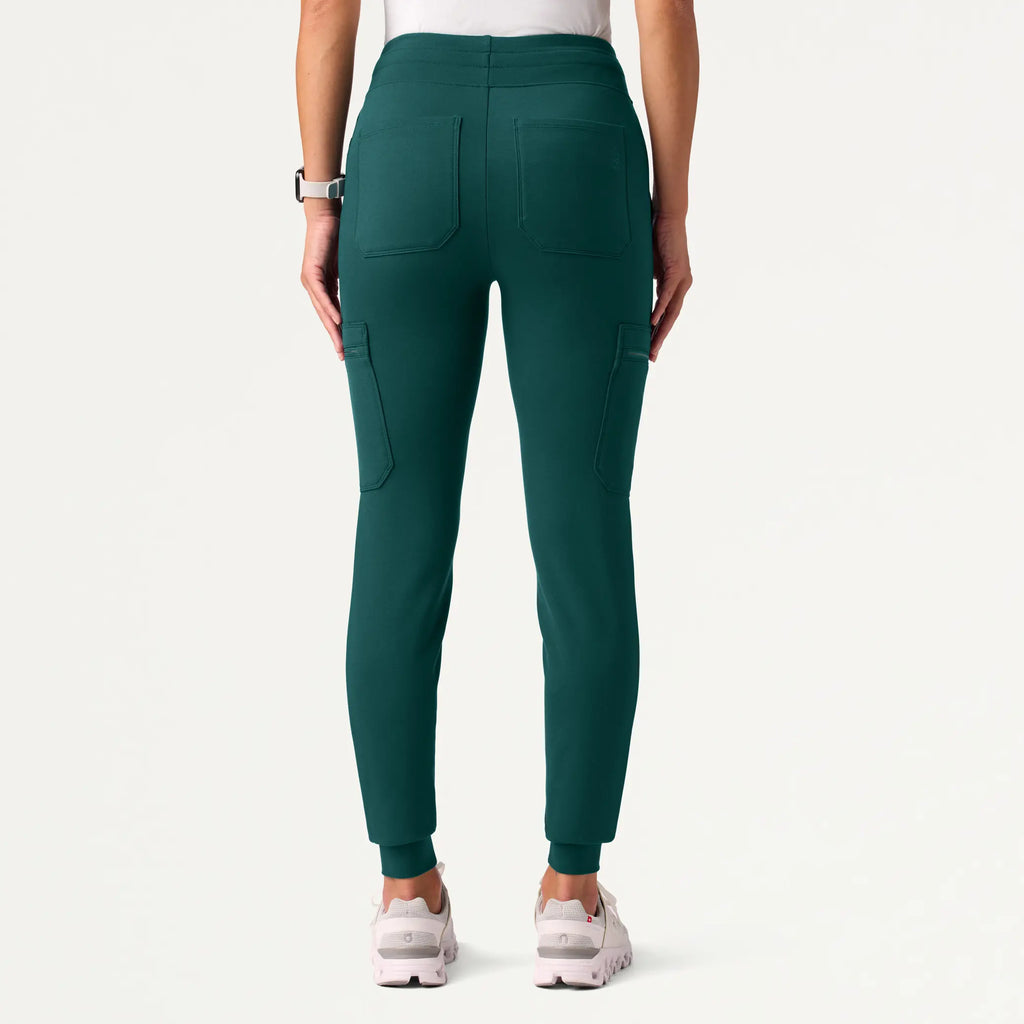 Jaanuu Scrubs Women's Abi 10-Pocket Skinny ULTRAsoft Scrub Jogger Midnight Green | scrub-supply.com