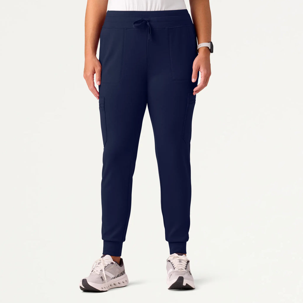 Jaanuu Scrubs Women's Abi 10-Pocket Skinny ULTRAsoft Scrub Jogger Midnight Navy | scrub-supply.com