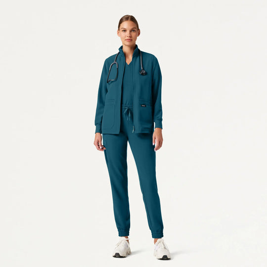 Jaanuu Scrubs Women's Ceri Essential 6-Pocket Scrub Jacket Caribbean Blue | scrub-supply.com
