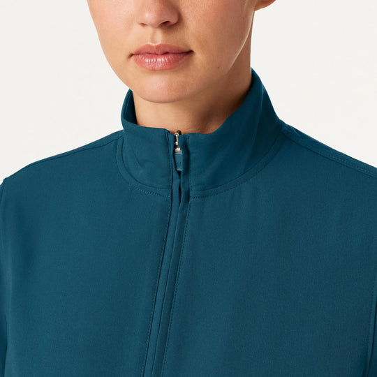 Jaanuu Scrubs Women's Ceri Essential 6-Pocket Scrub Jacket Caribbean Blue | scrub-supply.com