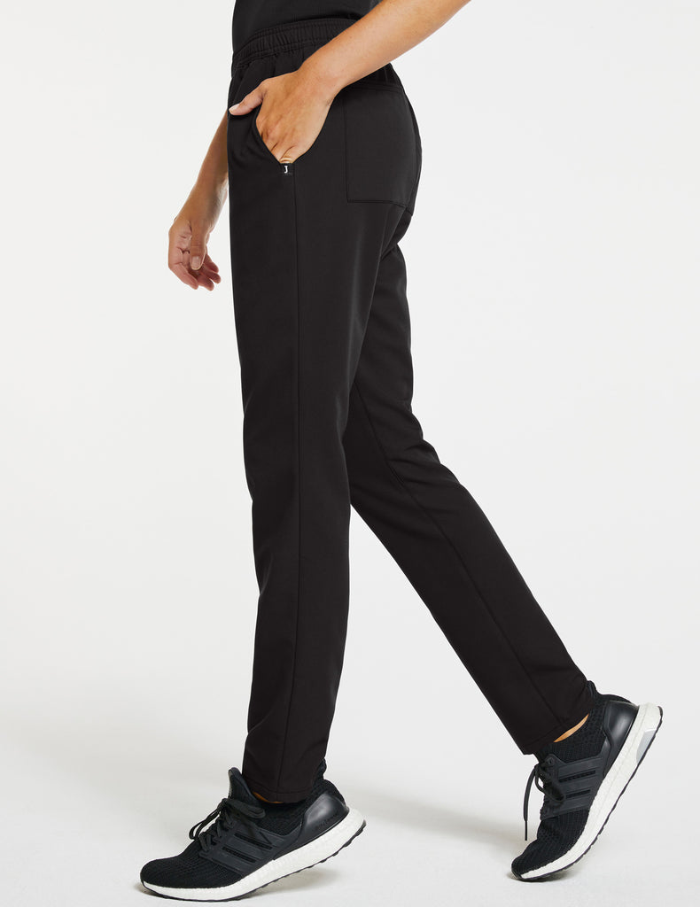 Jaanuu Women's Essential Relaxed Pant - Petite Black -  by scrub-supply.com