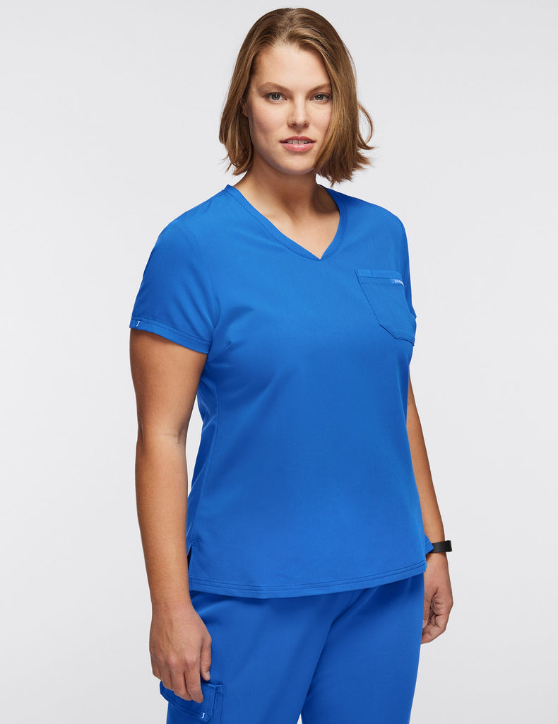 Jaanuu Women's 2-Pocket Tuck-In Top Coral -  by scrub-supply.com